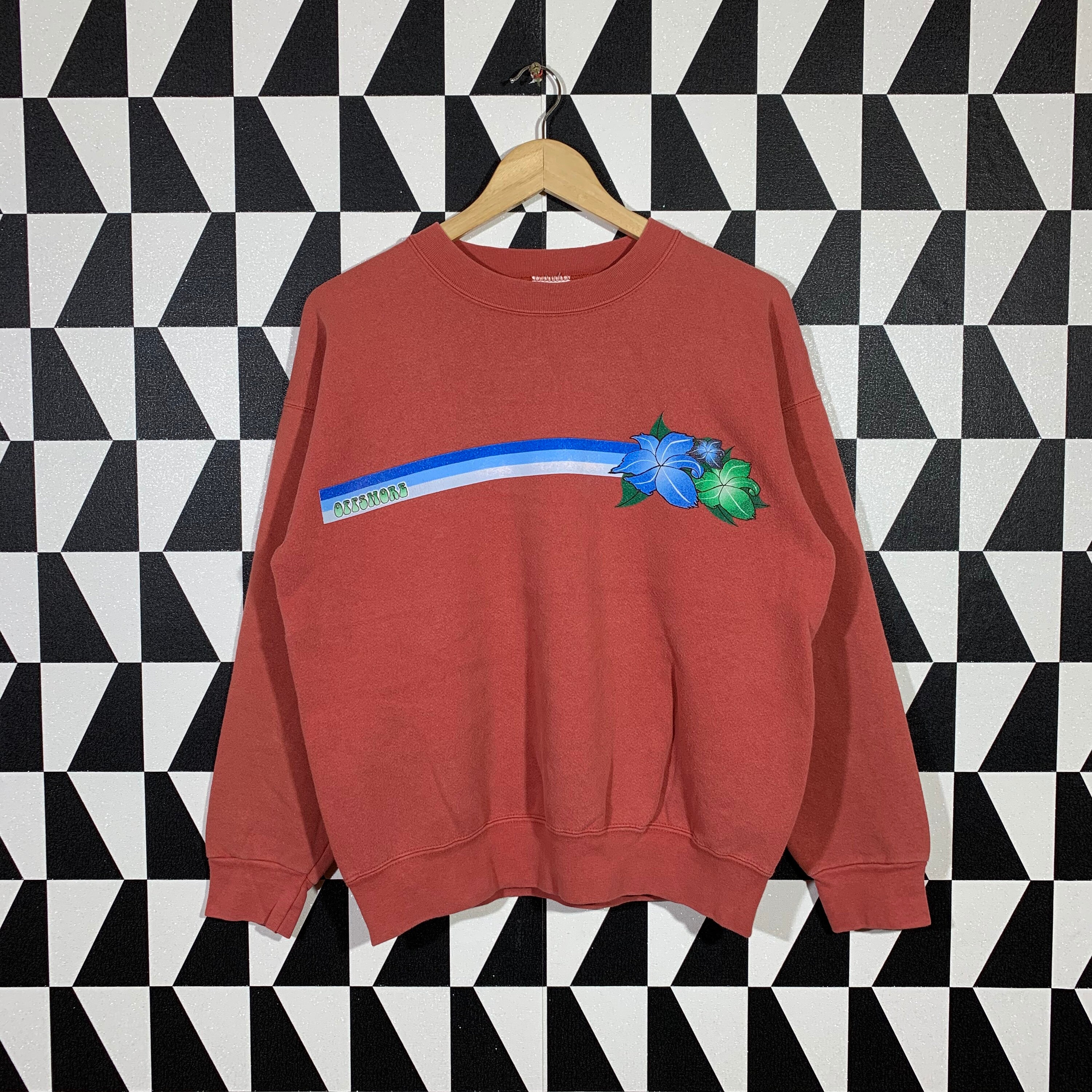 peach colored sweatshirt