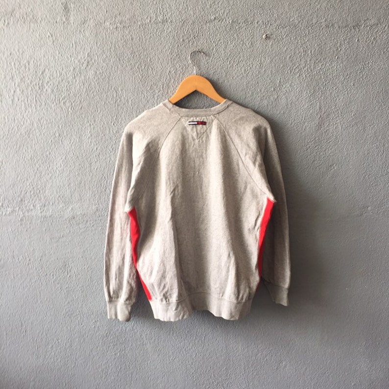 Vintage 90s Tommy Hilfiger Small Logo Embroidery Sweatshirt Crewneck Tommy Girl Pullover Grey And Red Colour Size M