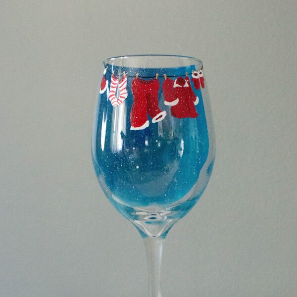 Hand Painted Santa Suit on a Clothesline 3D Wine Glass, Christmas Wine Glass, Winter Wine Glass, Santa Suit Wine Glass, Painted Wine Glass