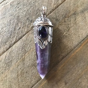 Amethyst point pendant set with an amethyst, handcrafted, Nepalese, Tibetan repousse silver, 73X20 mm