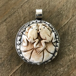 Bone carved double frog pendant, handcrafted, Nepalese, Tibetan repousse silver, 57X46 mm