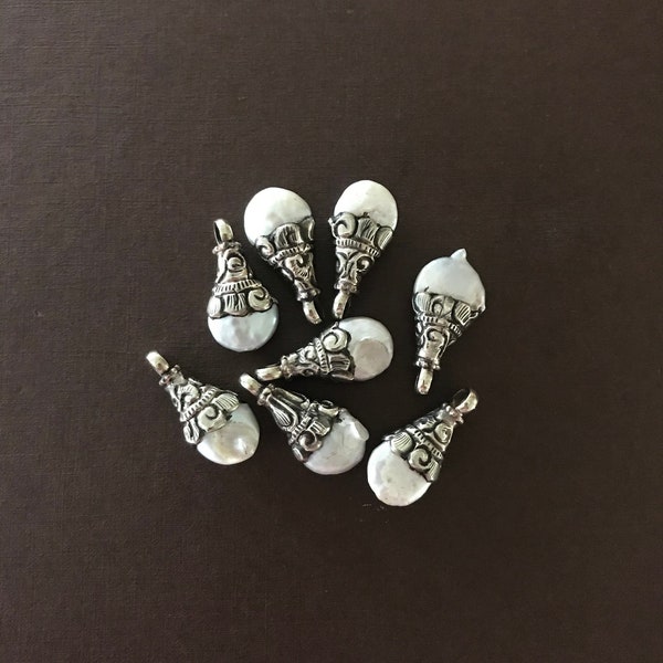 This listing is for 1 piece, Fresh water pearl charms, handcrafted, Nepalese, Himalayan, repousse silver, floral silver caps, pearl pendants
