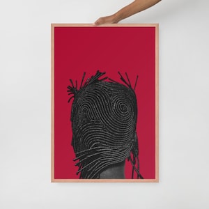 Puede incluir: Una impresión artística enmarcada que presenta una imagen en blanco y negro de una cabeza con intrincados patrones arremolinados. La obra de arte está sobre un fondo rojo vibrante, y el marco es de color madera natural.