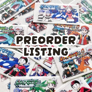 May include: A collection of rectangular white stickers featuring colorful illustrations of characters and creatures from the Pokémon franchise. The stickers have Japanese text and the words "PREORDER LISTING" in large, bold letters.