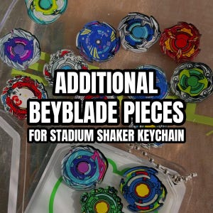 May include: A collection of colorful circular Beyblade-themed acrylic pieces featuring various designs, including a Hello Kitty motif. The text "ADDITIONAL BEYBLADE PIECES FOR STADIUM SHAKER KEYCHAIN" is overlaid in the center of the image.
