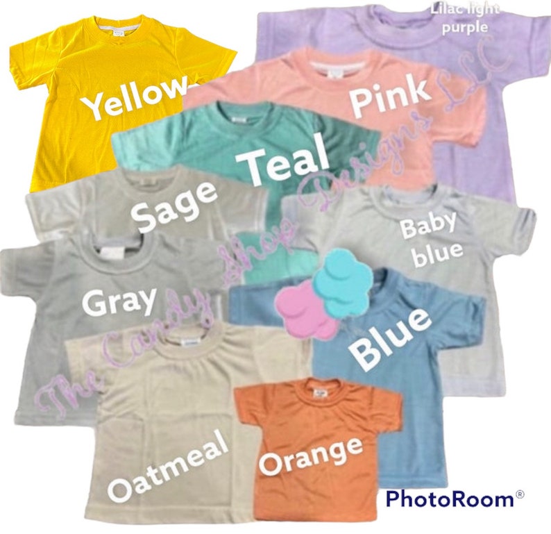 May include: A collection of ten plain t-shirts in various colors, including yellow, teal, sage, gray, oatmeal, orange, pink, baby blue, blue, and lilac light purple. The shirts are laid out on a flat surface.