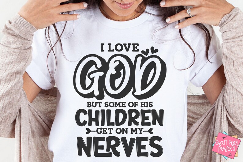 May include: White t-shirt with black text that reads "I love God but some of his children get on my nerves".