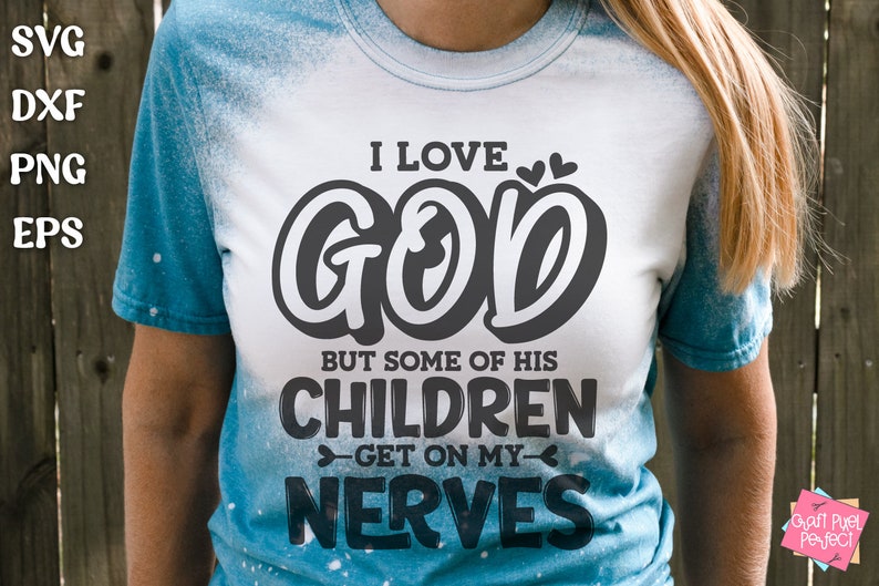 May include: A white t-shirt with a black graphic that says "I love God but some of his children get on my nerves".