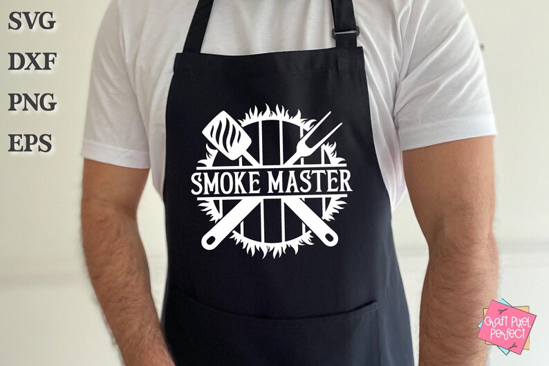 May include: A black apron with a white design of crossed grilling tools and a circle with flames around it. The text "SMOKE MASTER" is inside the circle.