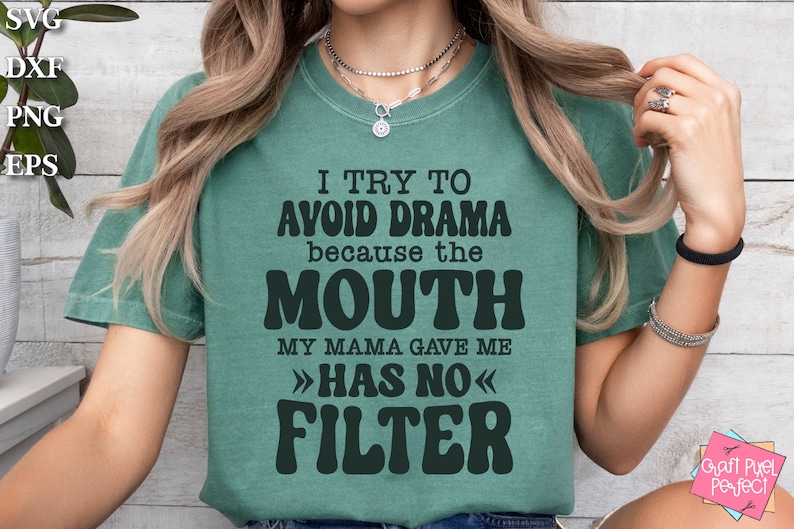 May include: A teal green t-shirt with the text "I try to avoid drama because the mouth my mama gave me >>has no<< filter" in black.