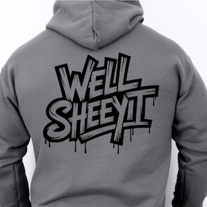 May include: A grey hoodie featuring the phrase "Well Sheeit" in a black graffiti style font. The hoodie has a hood and long sleeves. The text has a dripping effect. The image also includes SVG, DXF, PNG, and EPS file type logos.