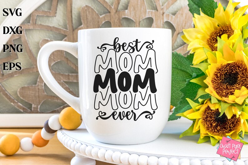 May include: White ceramic mug with a black design that says "best mom ever" with the word "mom" repeated three times in a stacked design.