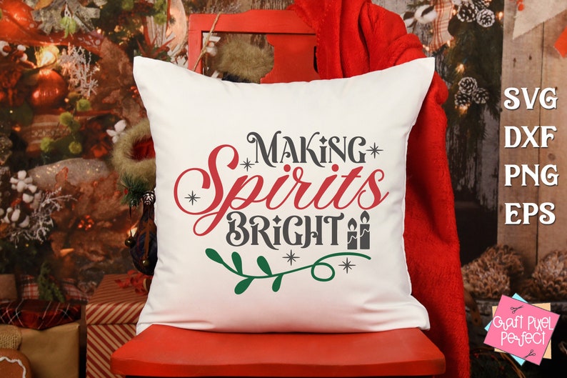 May include: White pillow with the text "Making Spirits Bright" in red, gray, and green lettering. The text is surrounded by a green leafy branch and small white stars.