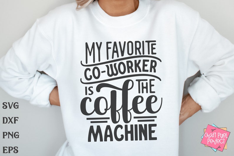 May include: White sweatshirt with the text "MY FAVORITE CO-WORKER IS THE coffee MACHINE" in black. The image also includes the file type abbreviations: SVG, DXF, PNG, and EPS. A pink and blue logo is in the bottom right corner.