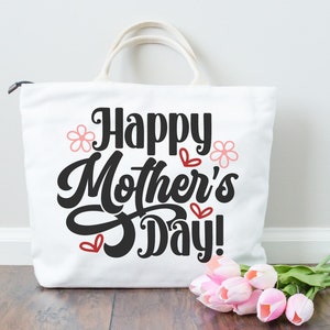 May include: White canvas tote bag with black text that reads "Happy Mother's Day!" with pink flowers and red hearts.