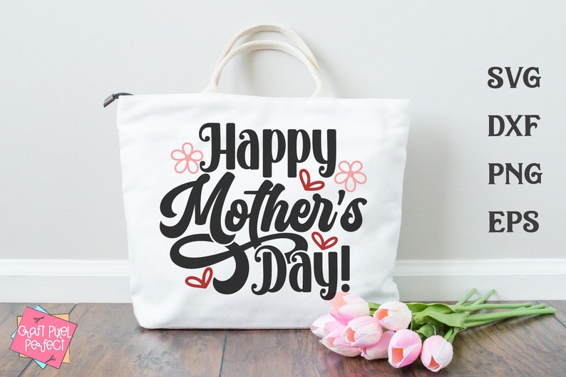 May include: White canvas tote bag with black text that reads "Happy Mother's Day!" with pink flowers and red hearts.