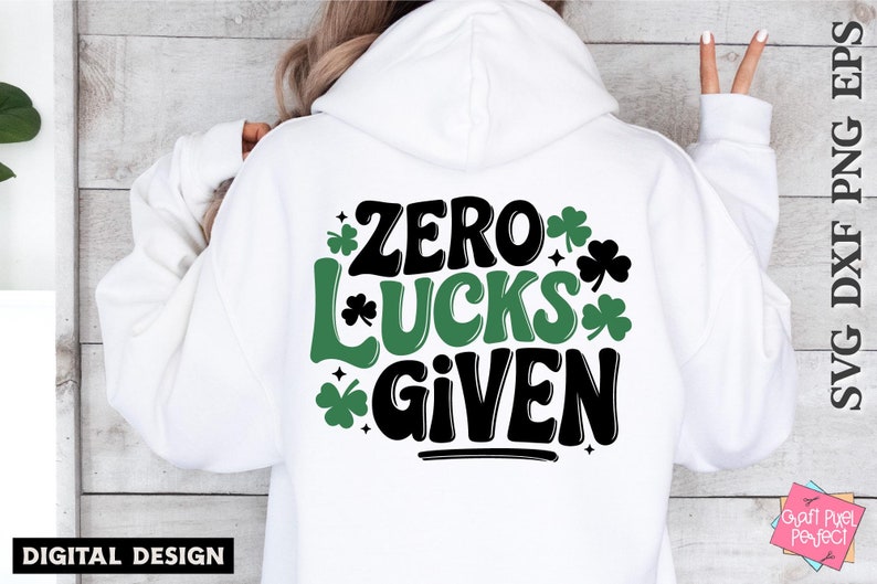 Add a sarcastic twist to your St. Patrick’s Day crafts with this funny 'Zero Lucks Given' design! Perfect for creating t-shirts, mugs, or tote bags, this witty and humorous cut file is compatible with Cricut and Silhouette for all your DIY projects."