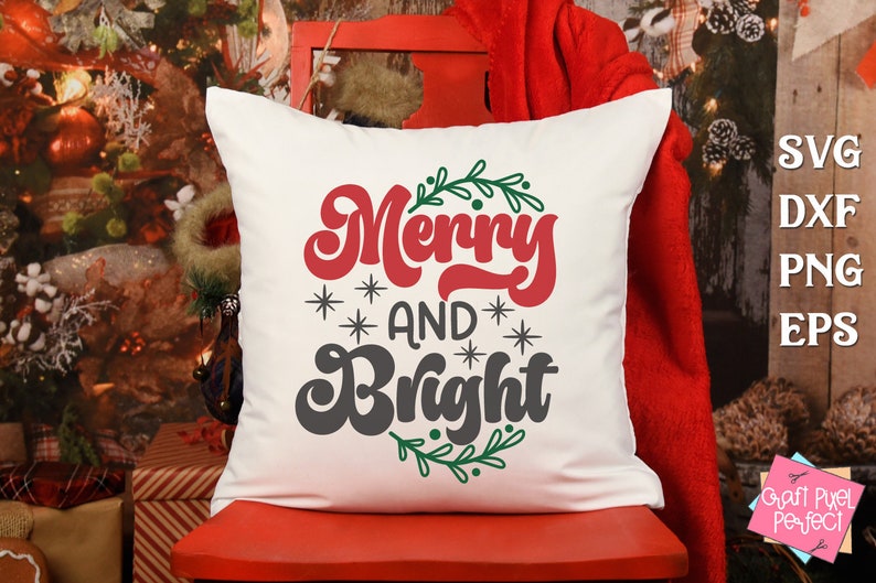 May include: White pillow with the text "Merry and Bright" in red and black lettering with green holly leaves around the text.