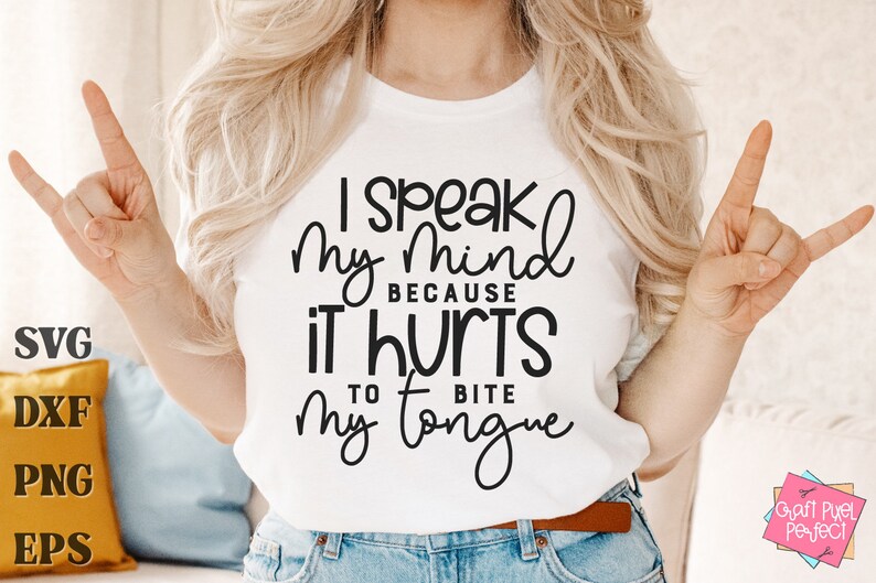 May include: A white t-shirt with black text that reads "I speak my mind because it hurts to bite my tongue".
