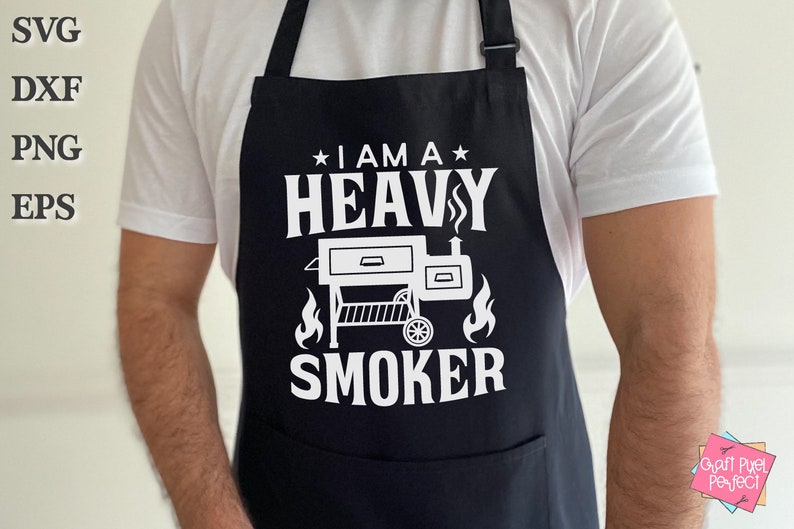 May include: A black apron with white text that reads "I am a Heavy Smoker" and a graphic of a smoker.