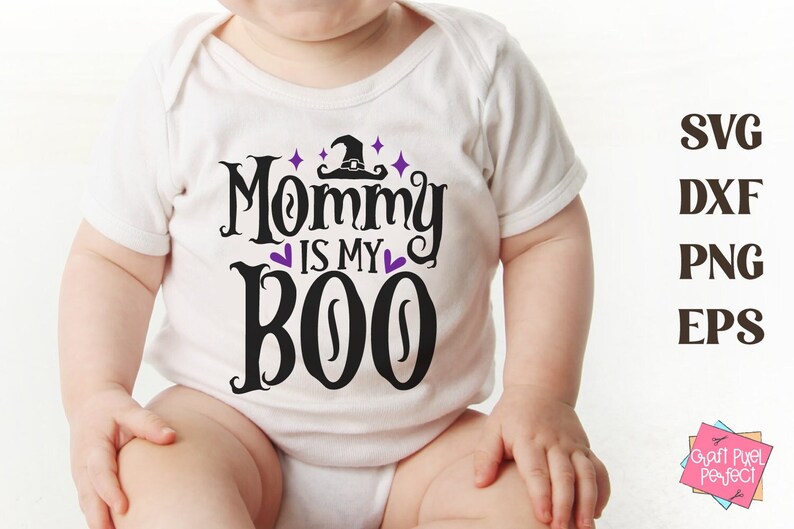 May include: A white baby onesie with black text that reads "Mommy is my Boo" with a purple witch hat and stars above the text.