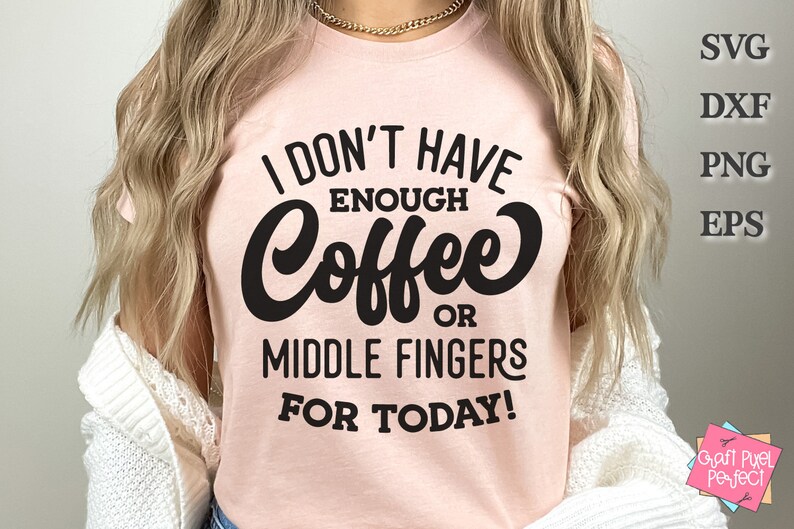 May include: A pink t-shirt with the text "I don't have enough coffee or middle fingers for today!" in black lettering.