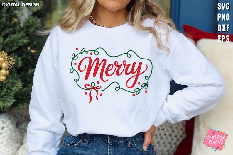 May include: White sweatshirt with the word "Merry" in red script, framed by a green wreath with red berries and a bow. The design is a digital graphic, perfect for holiday apparel.