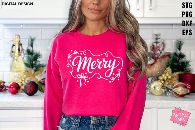 May include: A bright pink sweatshirt with the word "Merry" in white script, framed by a decorative border of leaves and bows. The sweatshirt is a festive holiday apparel item.