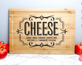 May include: A wooden chopping board with the text "CHEESE" in a decorative font. The board also lists a variety of cheeses including Gouda, Swiss, Cheddar, Havarti, Brie, Mozzarella, Camembert, and Pecorino.