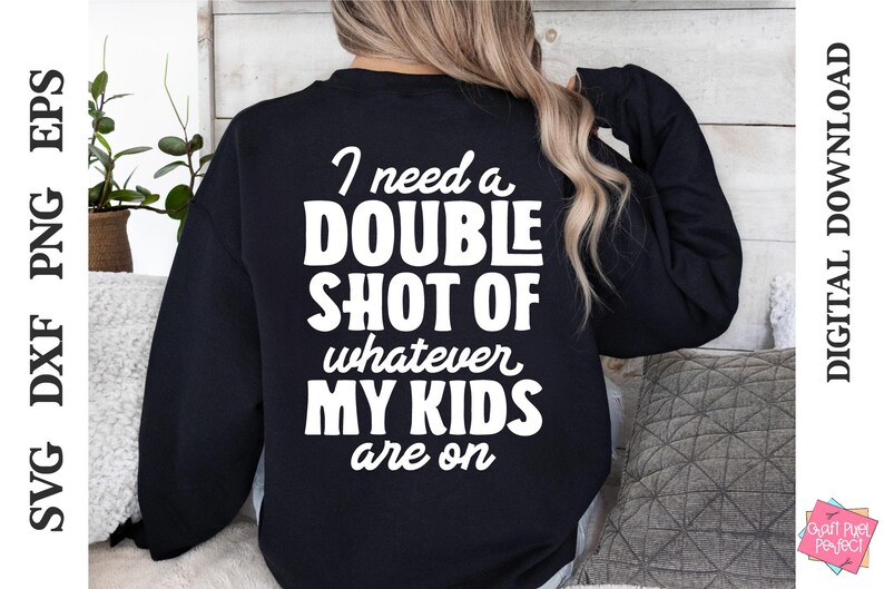 May include: A black sweatshirt with white text that reads "I need a double shot of whatever my kids are on".