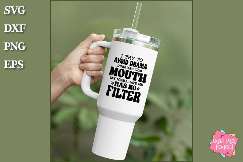 May include: White travel mug with a black handle and lid. The mug has a black graphic that reads "I try to avoid drama because the mouth my mama gave me >>has no<< filter".
