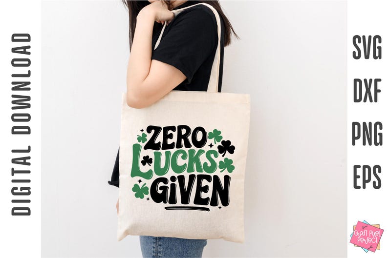 May include: A white tote bag with the text "Zero Lucks Given" in black and green shamrocks.