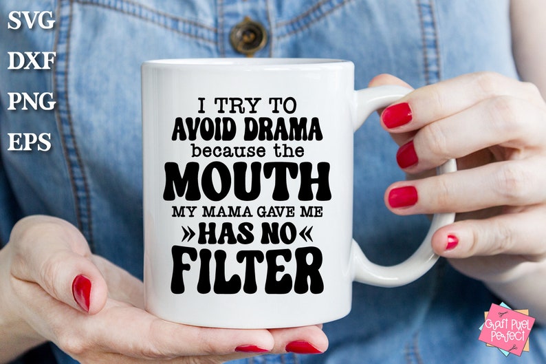May include: White ceramic coffee mug with black text that reads "I try to avoid drama because the mouth my mama gave me >>has no<< filter".