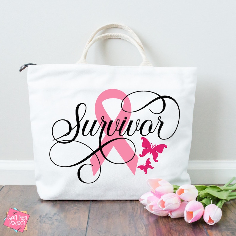 May include: White canvas tote bag with a pink ribbon and the word "Survivor" in black cursive script. Two pink butterflies are on the bag.