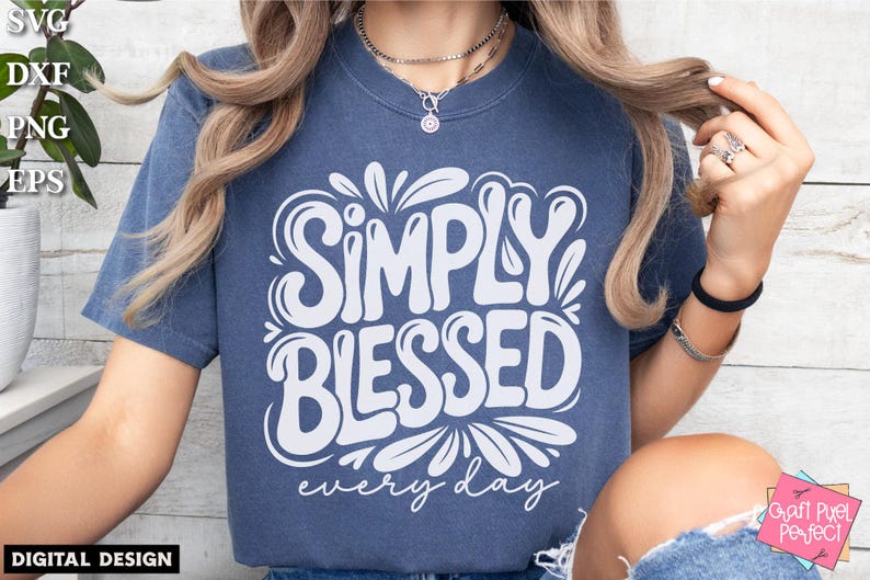 May include: A blue t-shirt with the words "SIMPLY BLESSED every day" in white script. The design is surrounded by decorative flourishes. The image also includes the text "DIGITAL DESIGN" and SVG, DXF, PNG, EPS file type icons.