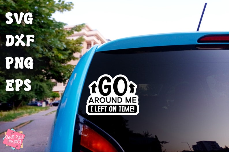 May include: A black and white car sticker with the text "GO AROUND ME I LEFT ON TIME!"  The sticker is on the back window of a blue car.