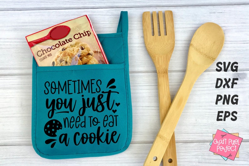 May include: Teal oven mitt with a pocket and the text "SOMETIMES you just need to eat a cookie" in black. A bag of chocolate chip cookie mix is in the pocket.
