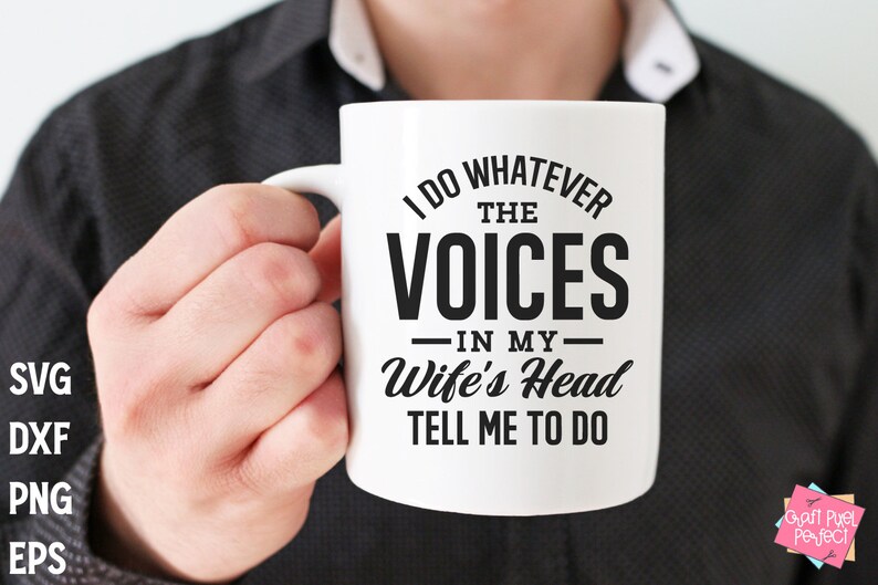 May include: White ceramic mug with a black design that reads "I do whatever the voices in my wife's head tell me to do".