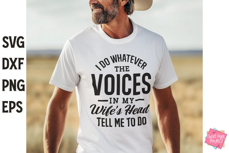 May include: A white t-shirt with a black graphic that says "I do whatever the voices in my wife's head tell me to do".