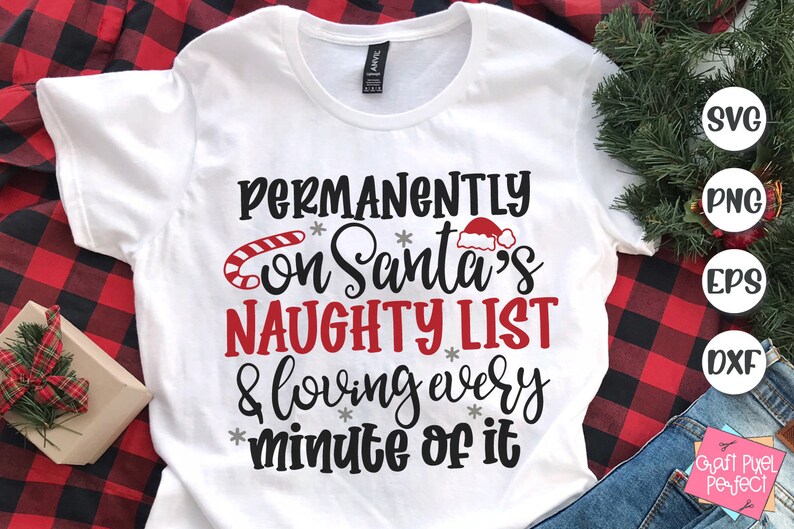 May include: White t-shirt with black text that reads "PERMANENTLY on Santa's NAUGHTY LIST & loving every minute of it". The text is decorated with a red candy cane, a red Santa hat, and snowflakes.