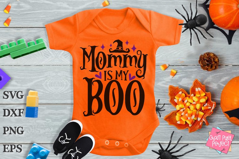 May include: Orange baby onesie with black text that reads "Mommy is my Boo" with a witch hat and stars above the text.