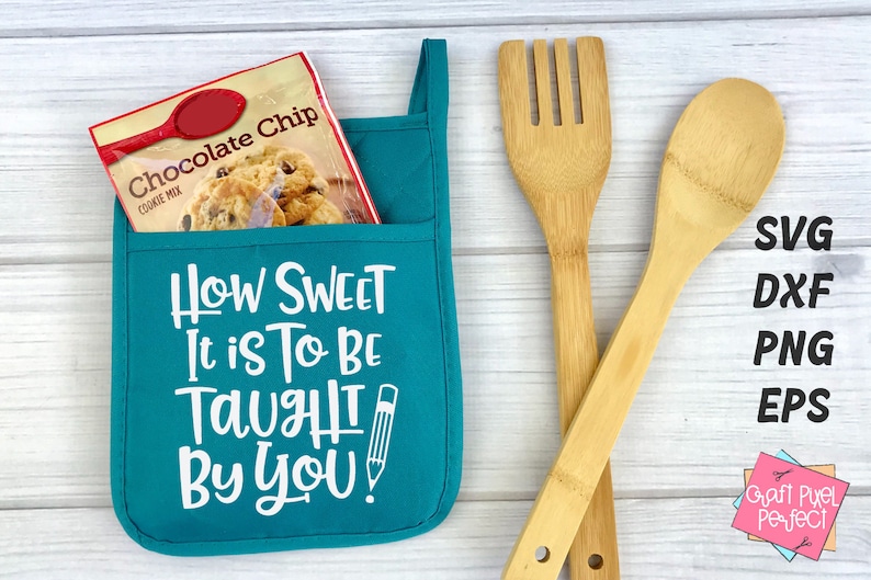 May include: Teal oven mitt with a pocket that has a package of chocolate chip cookie mix inside. The oven mitt has the text "How Sweet It Is To Be Taught By You!" with a pencil graphic.