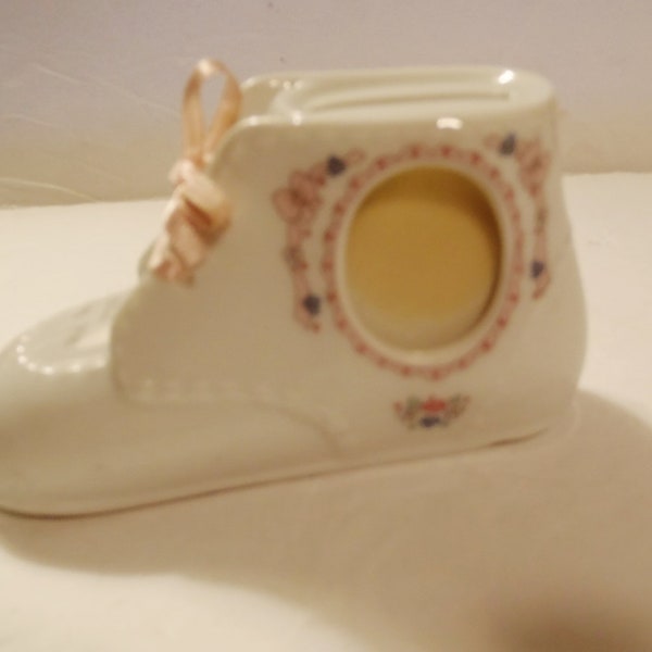 The Enesco Ceramic Precious Moments Baby Bootie Bank