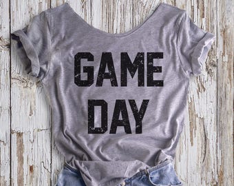 Buy 2, Get 1 FREE Tshirt GAME DAY Women&#39;s Off  Shoulder Slouchy Tee. Choice of 4 Colors!