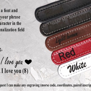 May include: Close-up of personalized leather tags in black, dark brown, light brown, red, and white. Each tag has white stitching and engraved text. The image includes text that says "I love you" and "select a font and write your phrase or character in the personalization field."
