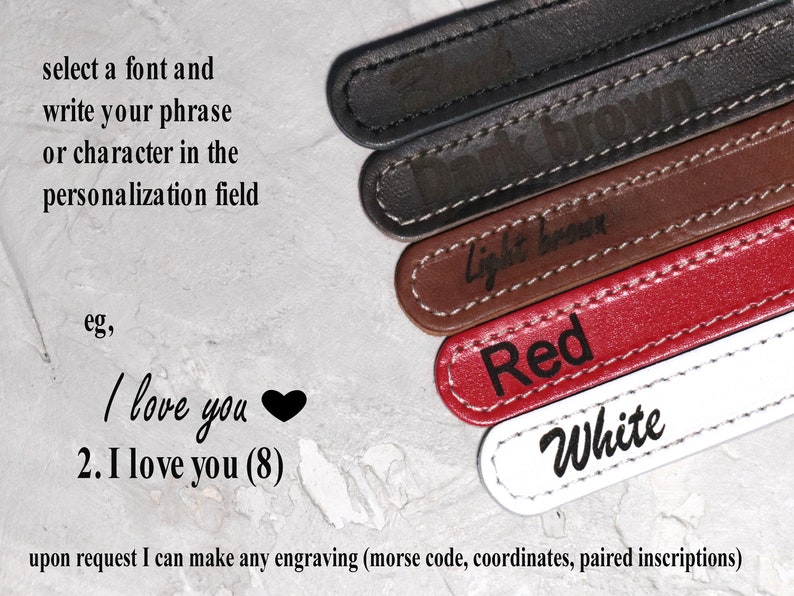 May include: Close-up of personalized leather tags in black, dark brown, light brown, red, and white. Each tag has white stitching and engraved text. The image includes text that says "I love you" and "select a font and write your phrase or character in the personalization field."