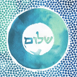 May include: A blue and green watercolour circle with a white background and the Hebrew word "Shalom" written in the centre. The circle is surrounded by a white background with a blue and green polka dot pattern.