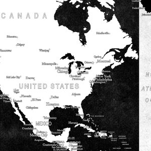 May include: A black and white map of North America with major cities labeled. The map includes Canada, the United States, Mexico, and the Caribbean islands.