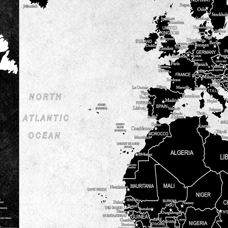 May include: A black and white world map with country borders and major cities labeled. The map is centered on Europe and Africa. The North Atlantic Ocean is labeled in the lower left corner.