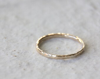 Solid gold hammered band